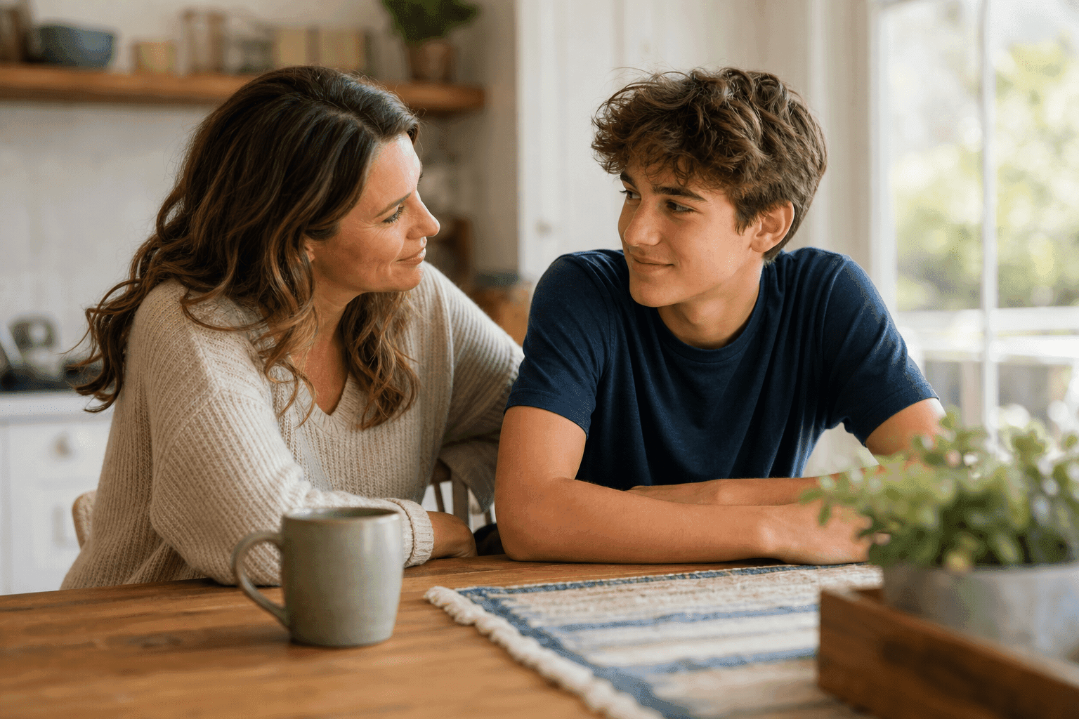 Parent and teen discussing admissions for adolescent residential treatment